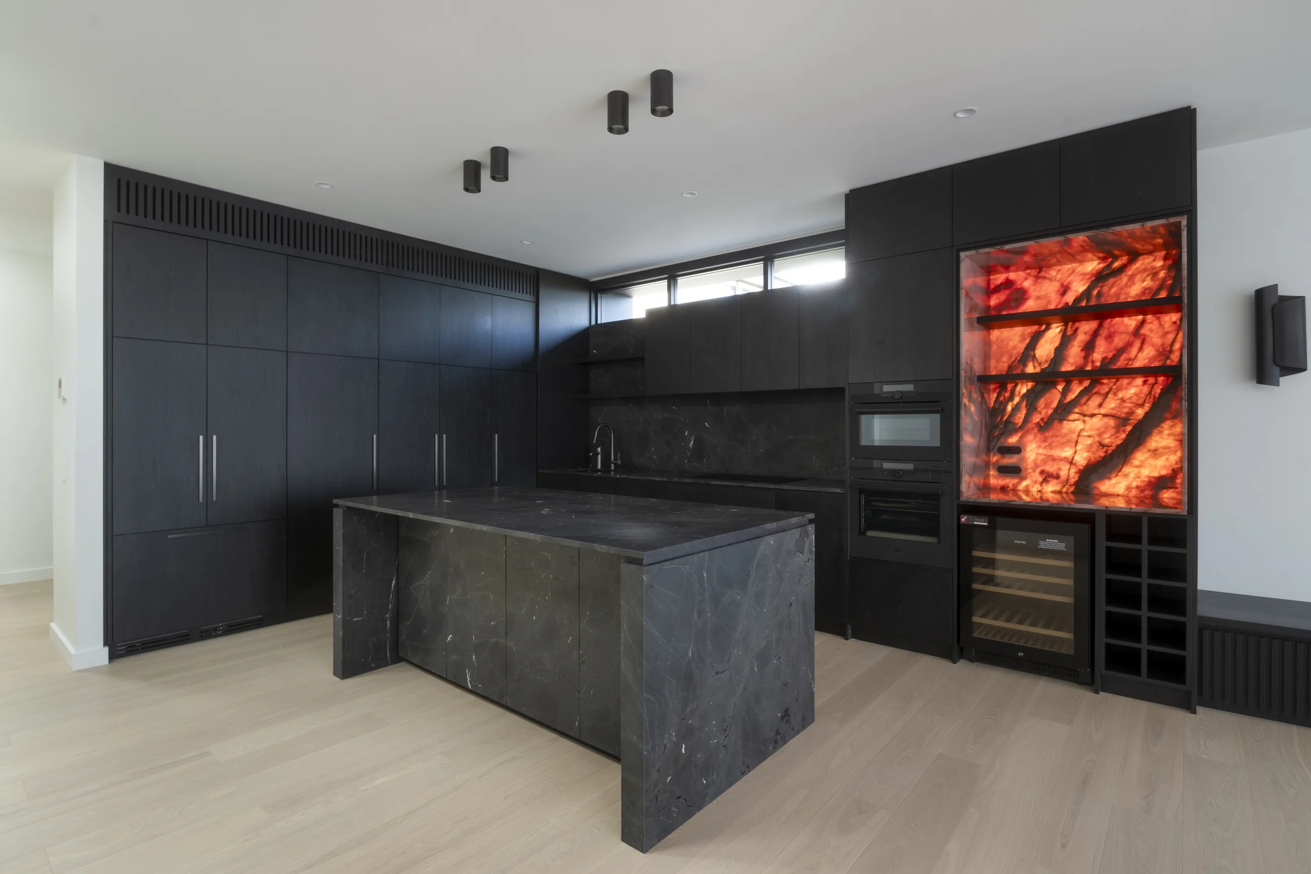 Black-oak kitchen with onyx feature — 59 Fairlight Street